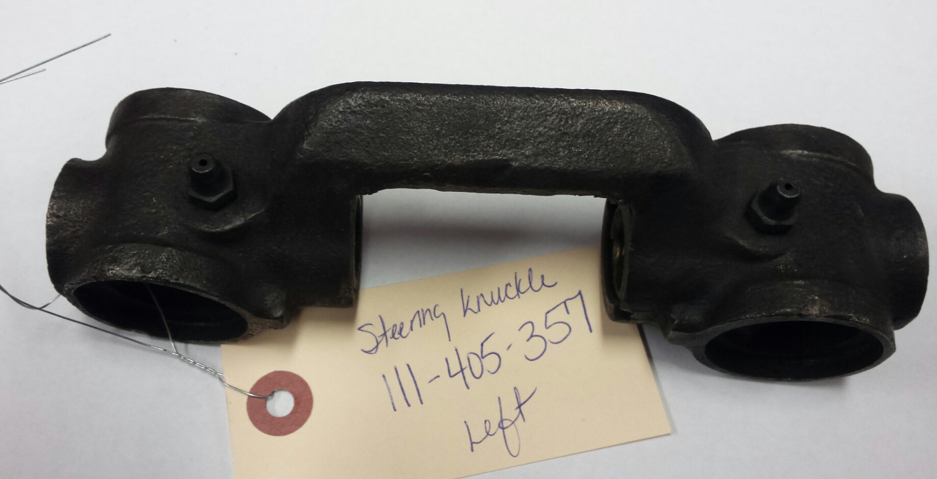 111-405-357 Left Steering Knuckle, USED